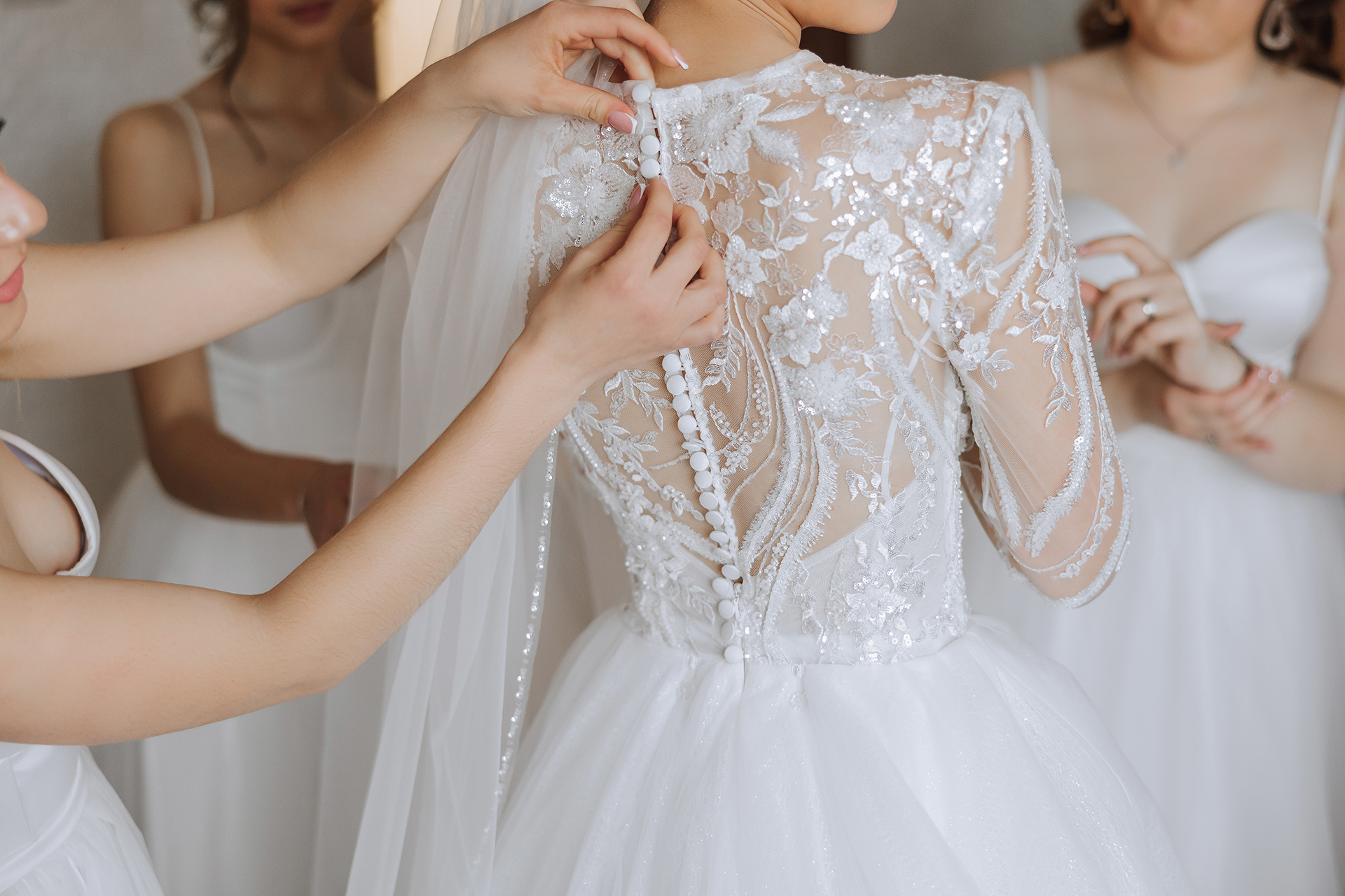 Bride in a fitted wedding gown at The Fitting Room on Edward