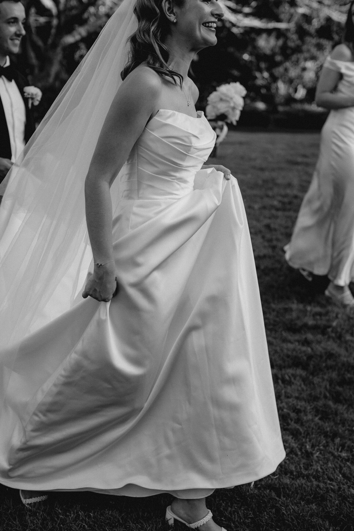 Bride in fitted wedding gown